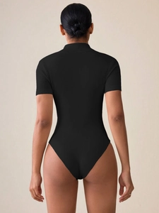 Back view detail of black ribbed knit short sleeve bodysuit with slim fit design