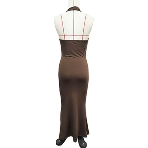 Detailed back view of brown halter neck maxi dress with open back and mermaid silhouette