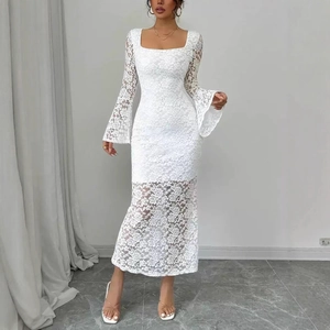 Close-up of white floral lace fabric and elegant bell sleeves on a slim midi dress