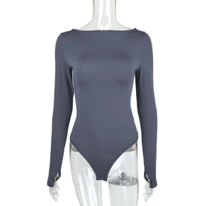 Detailed view of long sleeve bodysuit featuring functional thumb holes and charcoal fabric