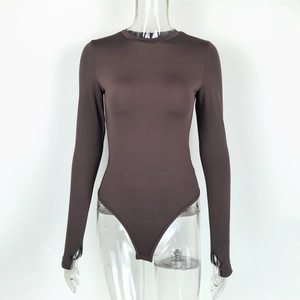 Detail view of coffee brown bodysuit with crew neck and thumbhole cuffs on model