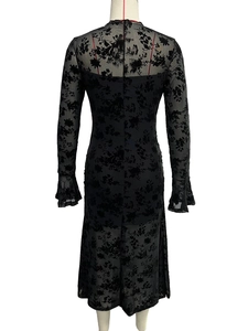 Detailed back view of a black floral lace fishtail dress with bell sleeves and zipper closure
