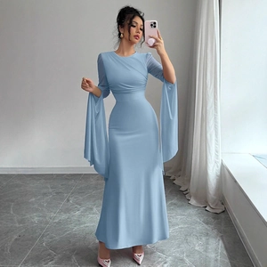 Detail of light blue mesh patchwork sleeve and waist pleats on slim fit fishtail maxi dress