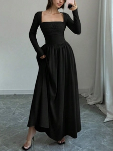 Elegant black long sleeve square neck maxi dress with slim fit waist and flared A-line skirt