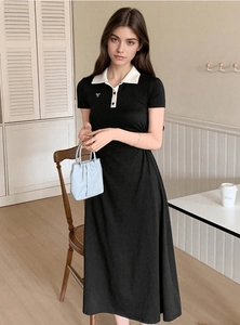 Short sleeve A-line polo dress in black and white contrast with bow embroidery detail
