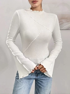 Slim fit white long sleeve top with lettuce edge collar and flared sleeves for women
