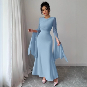 Detail of light blue mesh mermaid dress with pleated waist and flared split sleeves