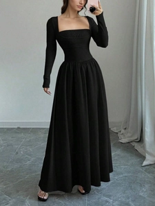 Slim fit black square neck long sleeve maxi dress with a-line high waist silhouette