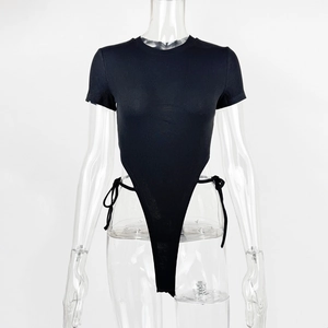 Detail of black ribbed bodysuit featuring high-cut leg and side lace-up tie design