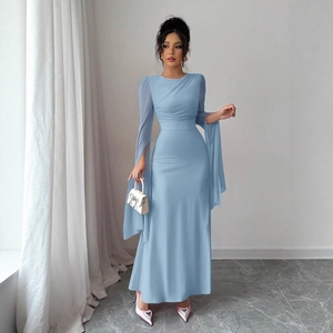 Detail of light blue evening gown featuring elegant split long sleeves with flowing fabric