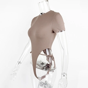 Side view of a ribbed knit brown bodysuit featuring high-cut sides and lace-up tie details