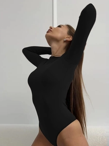 Close-up of black long-sleeve bodysuit with slim fit design and high-cut leg opening