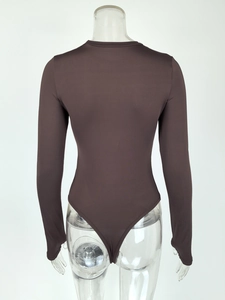 Back view of a coffee brown long sleeve bodysuit on a mannequin with high-cut design