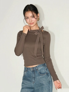 Brown ribbed long sleeve knit top with bow tie neck design for autumn winter fashion