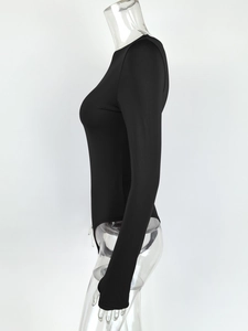 Side view of black long sleeve bodysuit with high cut leg on a mannequin