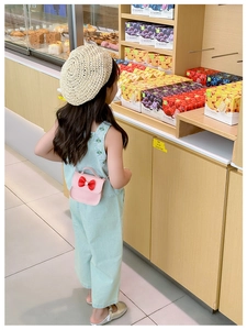 Sac bandoulière rose pour fille avec nœud rouge et bandoulière réglable