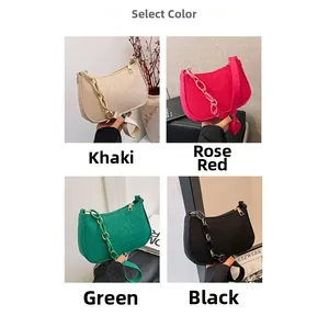 Detail view of crocodile pattern crossbody bags in khaki, rose, green, and black colors