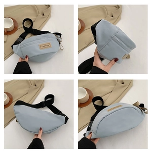 Dettaglio borsa a tracolla in nylon azzurro con cinturino regolabile e patch alla moda