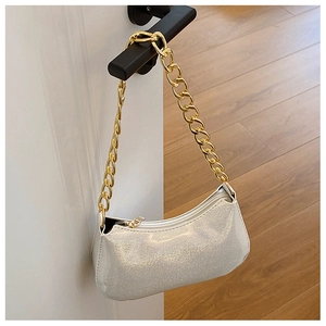Chic silver glitter underarm bag with bold gold chain strap for women in 2024