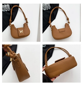 Multi-angle views of a caramel leather crescent bag with a gold butterfly buckle