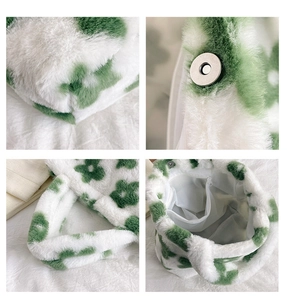 Detail view of plush flower tote bag showing soft texture, metal magnetic clasp and inner pocket