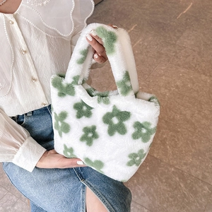 Plush white floral tote bag with green flower patterns and soft faux fur handles