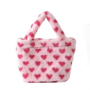 Pink plush tote bag with red heart patterns featuring soft faux fur for women