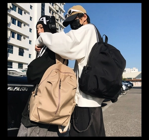 Minimalist large capacity couple backpacks for travel and school in black and khaki