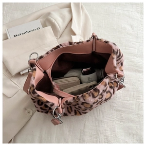 Top view of pink leopard plush tote bag interior showing large storage capacity