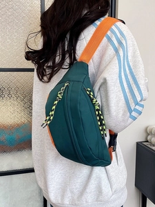 Fashionable forest green and orange contrast chest bag in durable nylon fabric