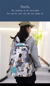 Close-up of abstract street style graffiti patterns on a casual canvas backpack