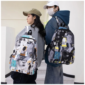 Detail showing high-capacity graffiti backpack with adjustable straps on models