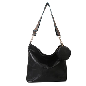 Black vintage textured tote bag with colorful ethnic jacquard wide shoulder strap