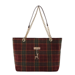 Retro plaid tote bag with gold chain handles and deer charm accessory on white background