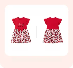 Front and back detail of a red and white baby dress with ladybug print and bow decor