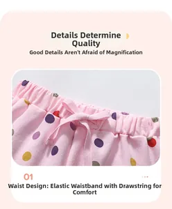 Détail du short rose à pois pour bébé fille avec taille élastique et cordon de serrage