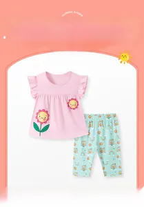 Detail of pink ruffle sleeve top with sunflower and rainbow print pants for girls aged 2-7