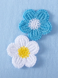 Short sleeve girls cotton dress featuring blue and white crochet flower embroidery patches