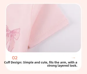 Close-up of baby girl pink cotton top sleeve featuring a cute bow pattern detail
