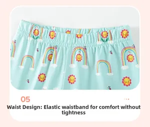 Detail of the elastic waistband on cotton toddler shorts with cute rainbow prints