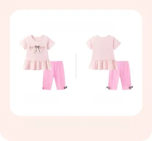Front and back detail of pink girls' short sleeve ruffled T-shirt and bow accent leggings set