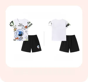 Detail showing white t-shirt with space astronaut print and black shorts kids set