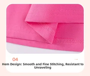 Vue macro des coutures doubles renforcées et de l'ourlet sur une robe rose en maille coton