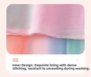 Detail view of rainbow tulle dress with high-quality overlock stitching on the inner lining