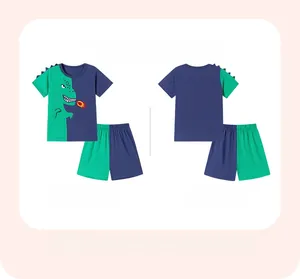 Detail view of boys' dinosaur summer set featuring 3D fin accents and fiery print