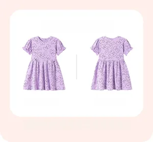 Front and back view of a lavender short-sleeve girls' dress with heart patterns