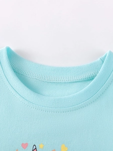 Light blue mesh dress for girls featuring a round neck with detailed double stitching