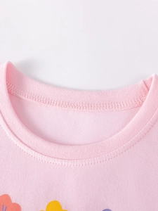 Pink crew neck cotton t-shirt with delicate floral print and ribbed stitching details