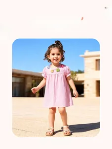 Pink short sleeve girl dress with crochet flowers and puff sleeves for summer