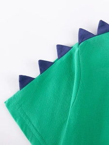 Green cotton kids short sleeve set featuring 3D blue dinosaur spine design on shoulders